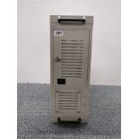 A grey metal External PCLe storage array Chassis.