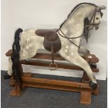 A vintage 'Horseplay' child's wooden rocking horse, H. 115cm L. 120cm.