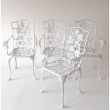 A set of four white painted metal garden armchairs, 95 x 54 x 45.