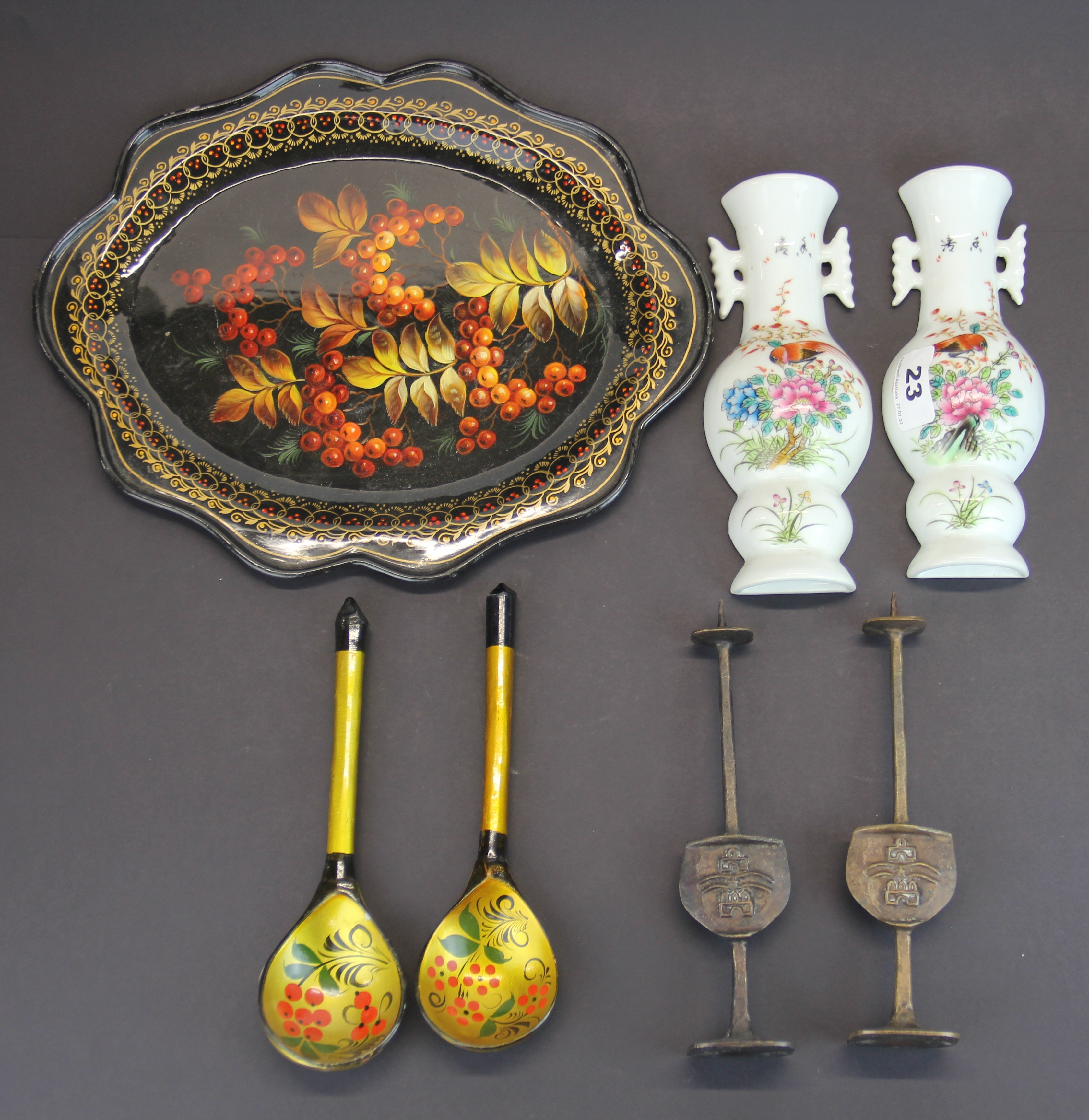 A Russian hand painted tin tray and wooden spoons, together with a pair of Chinese porcelain wall