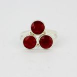 A 925 silver ring set with three rubies, (O).