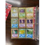 A collection Pokémon cards.