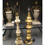 A pair of turned wood and metal table lamp bases, H. 47cm. Together with a gilt wood table lamp base