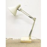 A vintage anglepoise table lamp.