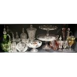 A pair of Victorian green glass decanters and other glassware.