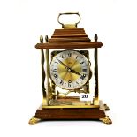 A Schatz chiming gilt and wood mantle clock , H. 30cm. With original packing box.