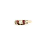 An antique hallmarked 18ct yellow gold ring set with rose cut diamonds and rubies, (Q).