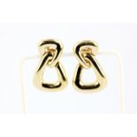 A large pair of 1980's Christian Dior gold plated chain link style clip on earrings, L. 4.2cm.