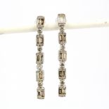 A pair of 18ct white gold drop earrings set with baguette and brilliant cut diamonds, approx. 1.60ct