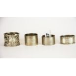 A group of four hallmarked silver napkin rings.