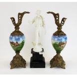 A painted French spelter figure and a pair of metal mounted urns, H. 47cm.