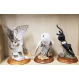 Three Franklin Mint ceramic figures on wooden bases, tallest H. 35cm. Small repair to owl wing.