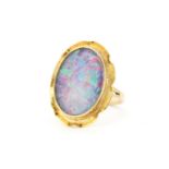 A 14ct yellow gold ring set with a large oval cut triplet opal, opal size approx. 2.2 x 1.6cm, (N.