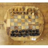 An olive wood chess board and wooden chess set, Dia. 40cm.