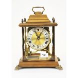 A Schatz chiming gilt and wood mantle clock , H. 30cm. With original packing box.