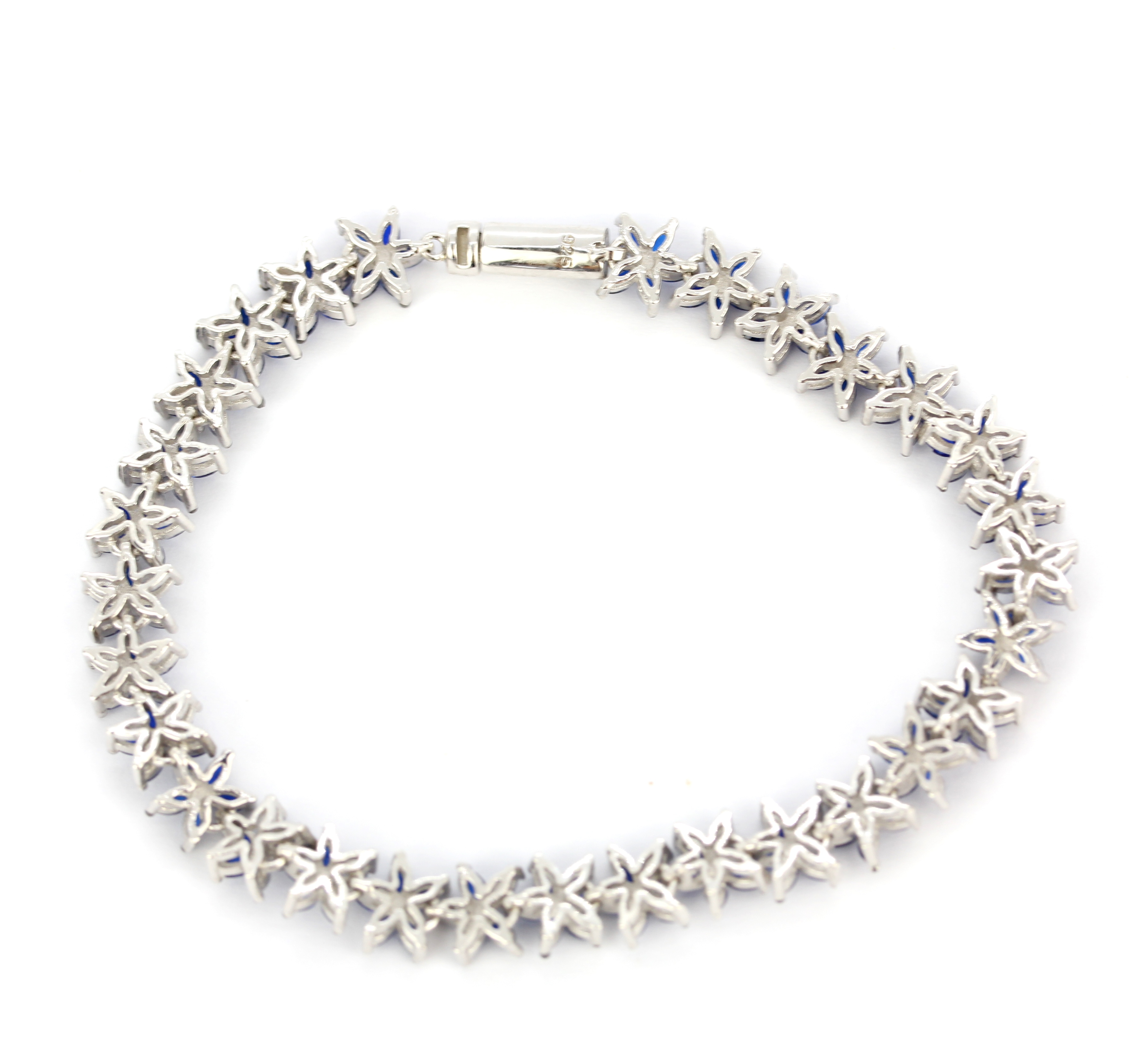 A 925 silver flower style tennis bracelet set with marquise cut sapphires, L. 19cm. - Image 3 of 3