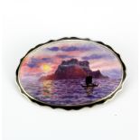 A 1920/30's 925 silver hand enamelled brooch depicting a boat on water at sunset, L. 6cm.
