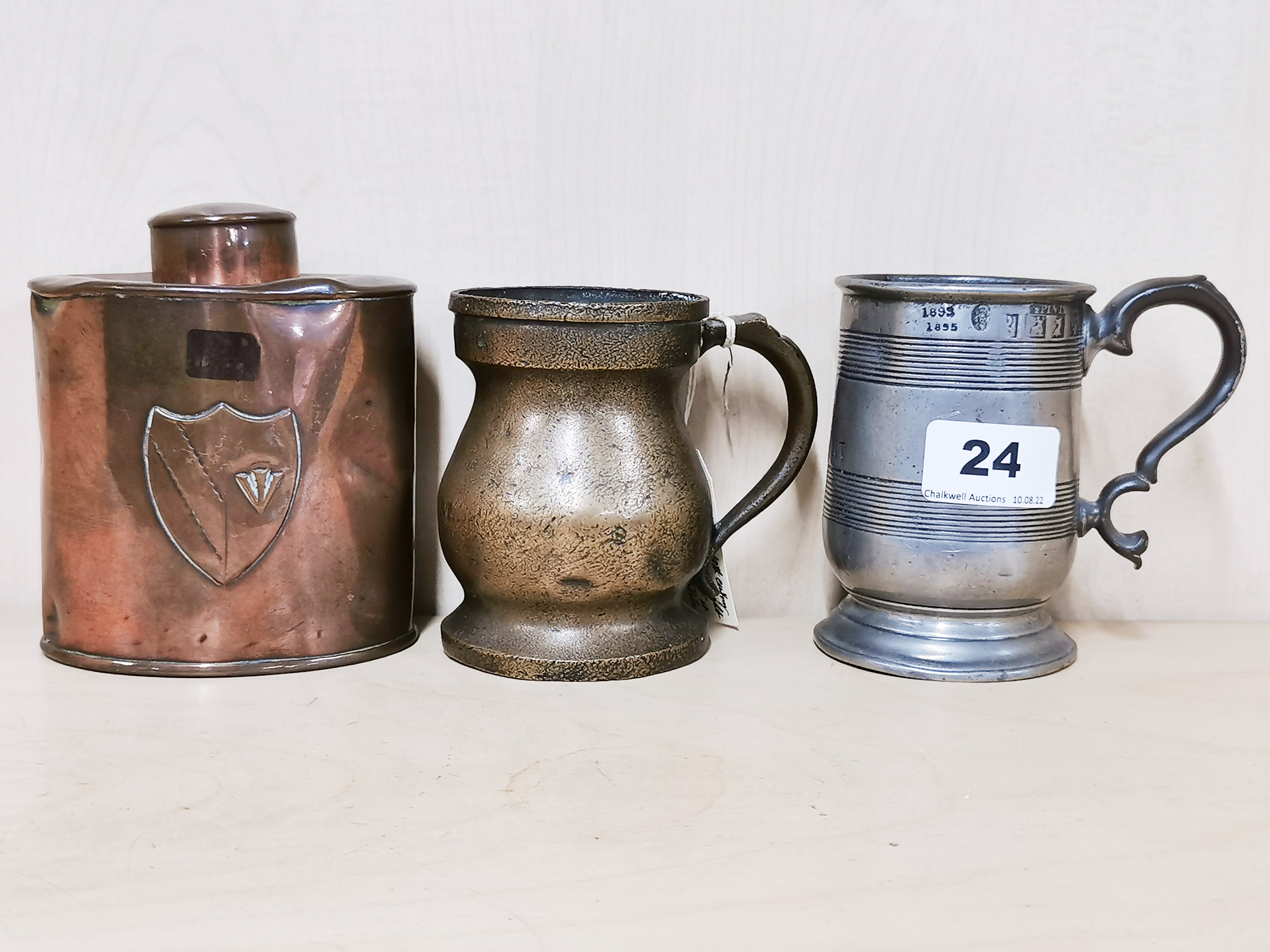 A 19th century bronze half pint measure, together with a half pint pewter tankard a hammered - Image 2 of 6