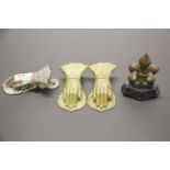 Three Victorian hand shaped letter clips with a cast iron doorstop. Prov. Estate of the late Dr.