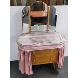 A mirror backed pine dressing table with plate glass top, 91 x 127cm.
