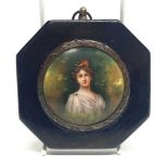 A 19th century framed hand painted miniature on porcelain, frame W. 10cm.