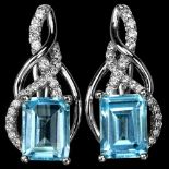 A pair of 925 silver earrings set with baguette cut blue topaz, L. 2.1cm.