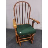 A light oak Tutti Bambini adjustable rocking chair, H. 108cm.