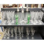 Three Dartington glass decanters (one A/F to rim) with a quantity of matching air stem glasses,