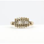A hallmarked 9ct yellow gold ring set with baguette and round cut diamonds, approx. 0.50ct total, (