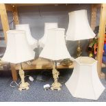 A group of mixed table lamps.