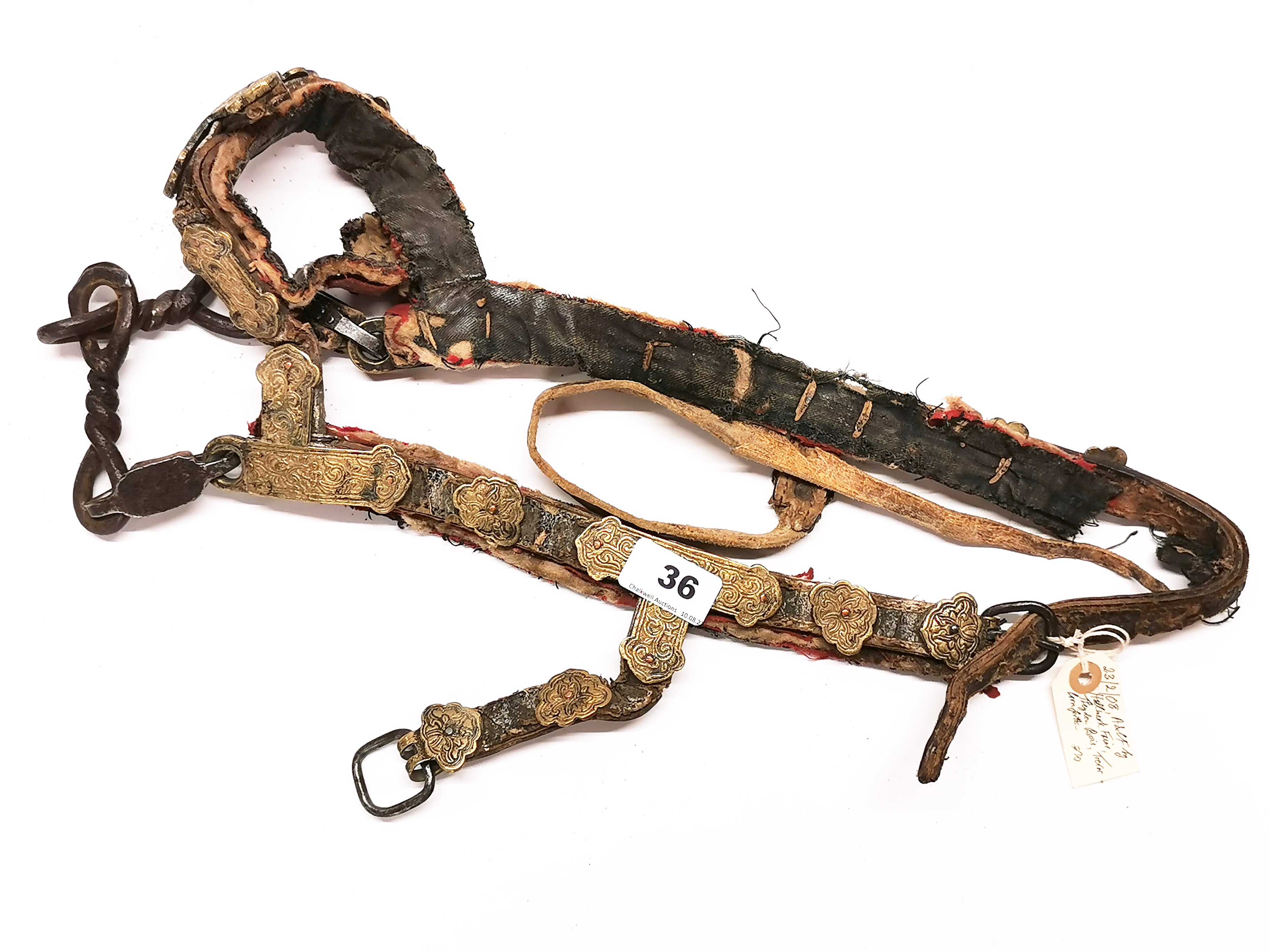 An early Tibetan steel and leather yak bridle. Prov. Estate of the late Dr. James (Jim) Bynon.