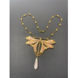 An interesting handmade enamelled gold plated Art Nouveau style dragonfly pendant with rose quartz