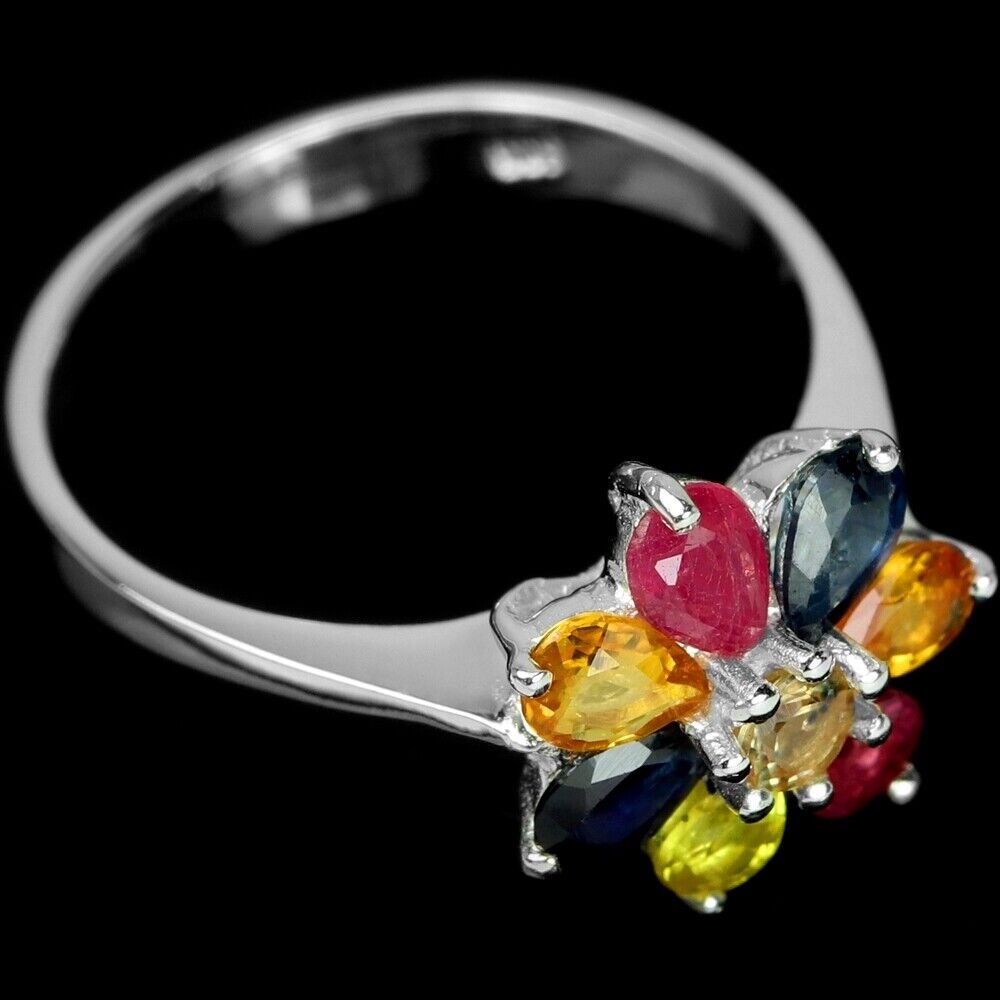 A 925 silver flower shaped ring set with oval cut sapphires and fancy colour sapphires, (M). - Image 2 of 2