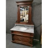 A 19th century French oak and marble wash basin and mirror, W. 104cm. H. 189cm.
