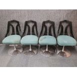 A set of four 1970's chrome and plastic kitchen/ dining chairs.