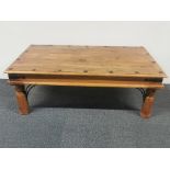 An Indian hardwood coffee table, 110 x 60 x 40cm.