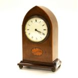 An Edwardian inlaid mahogany arched mantel clock, H. 22cm.