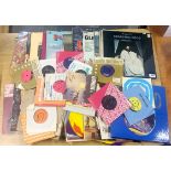 A quantity of mixed LP and singles records.