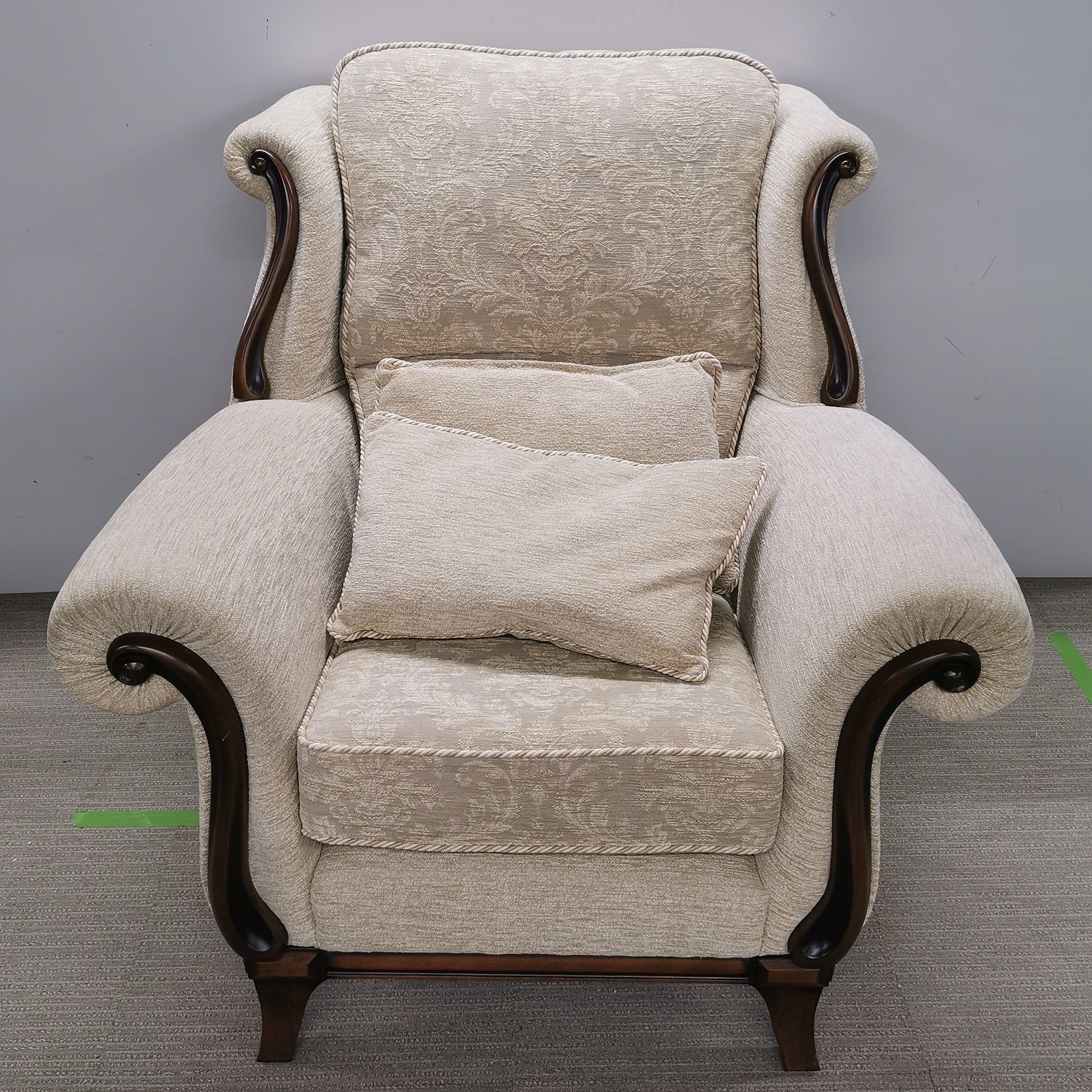 A heavy quality cream upholstered settee with a matching armchair and an Ercol footstool. - Image 3 of 5