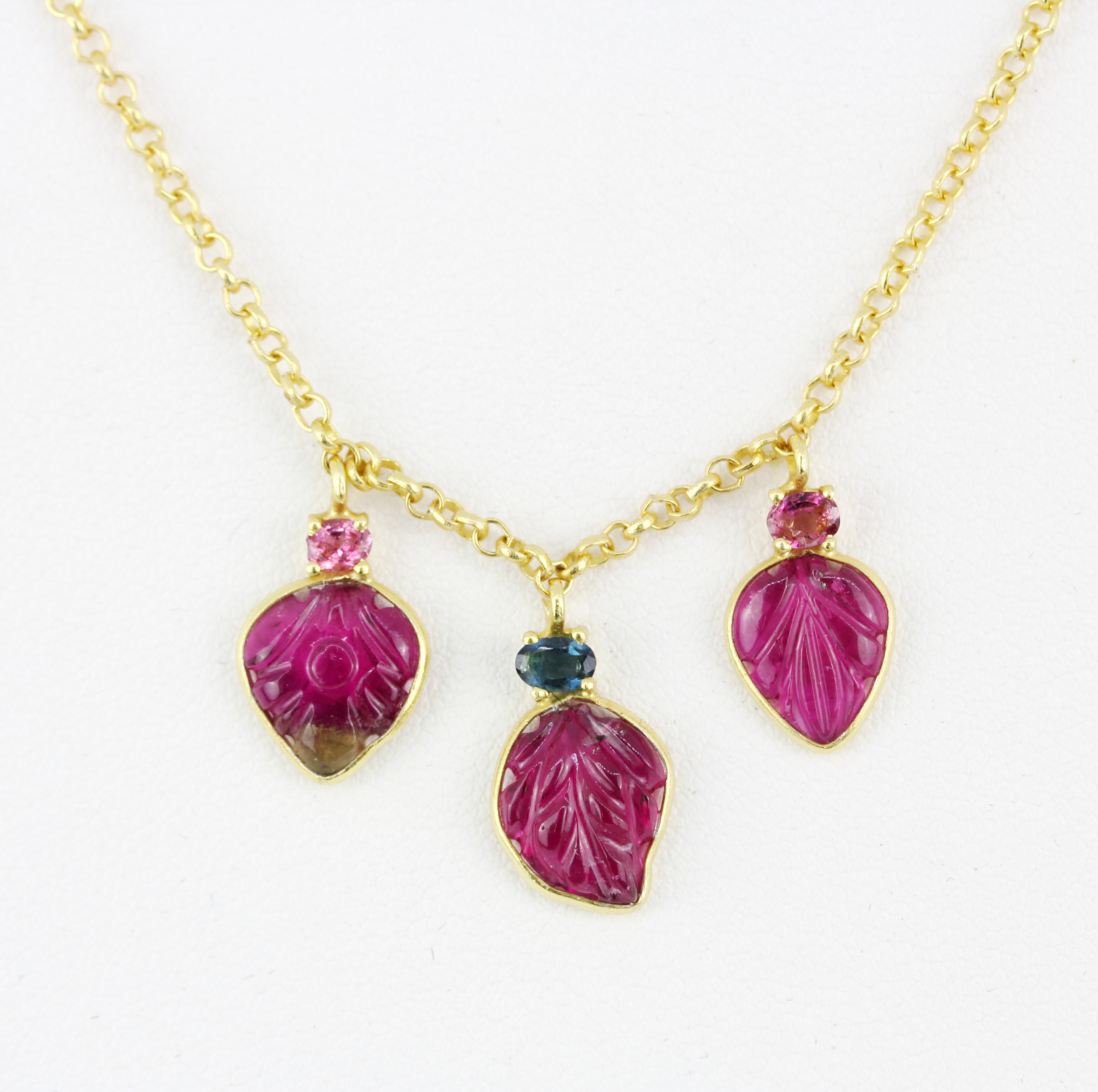 A 925 silver gilt necklace set with carved watermelon tourmaline, L. 42cm. Slight repair to one