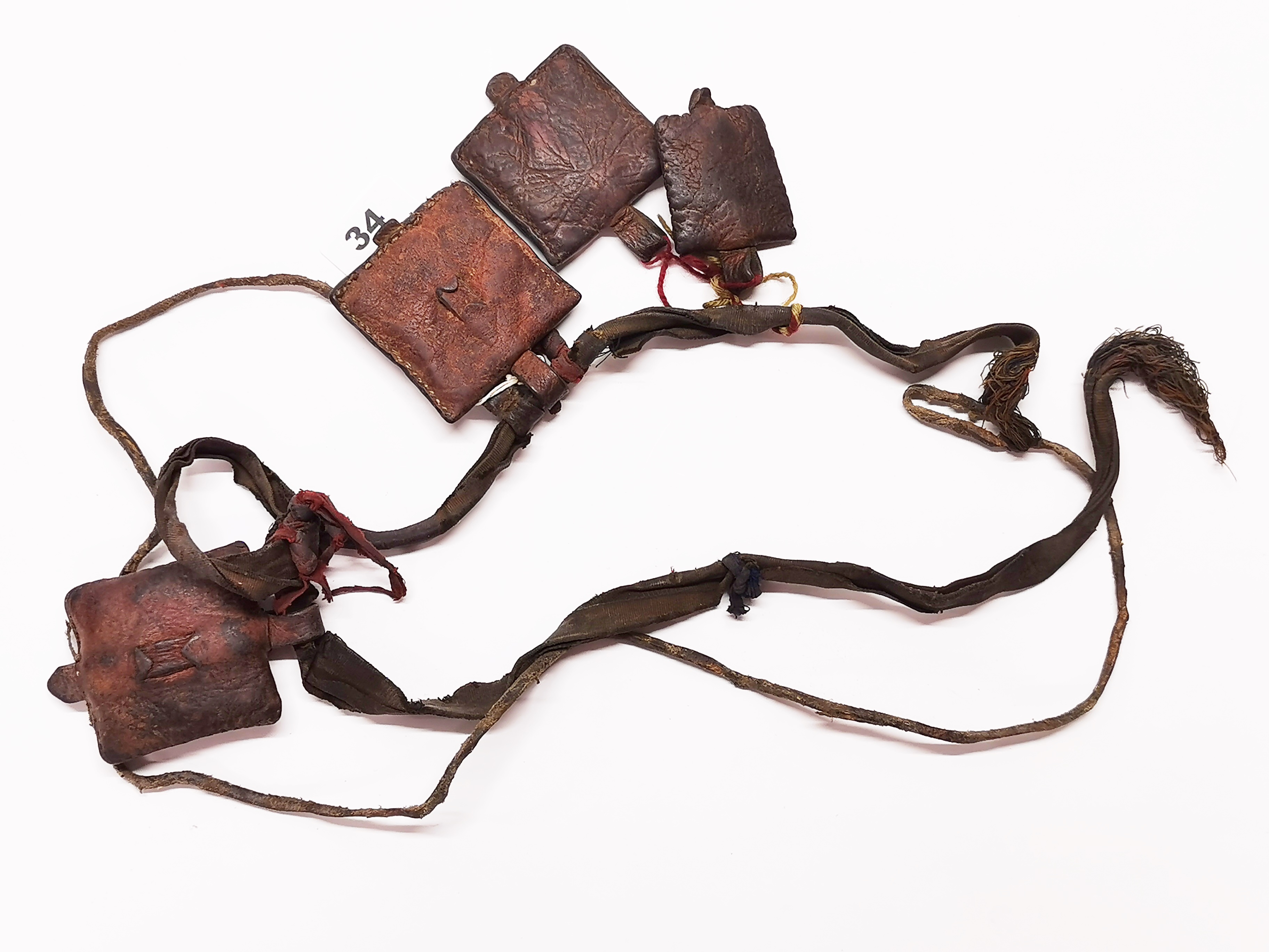 A Tibetan Nomad's leather sash with pouches containing prayers originally from Gyantse, Tibet. Prov. - Image 2 of 2