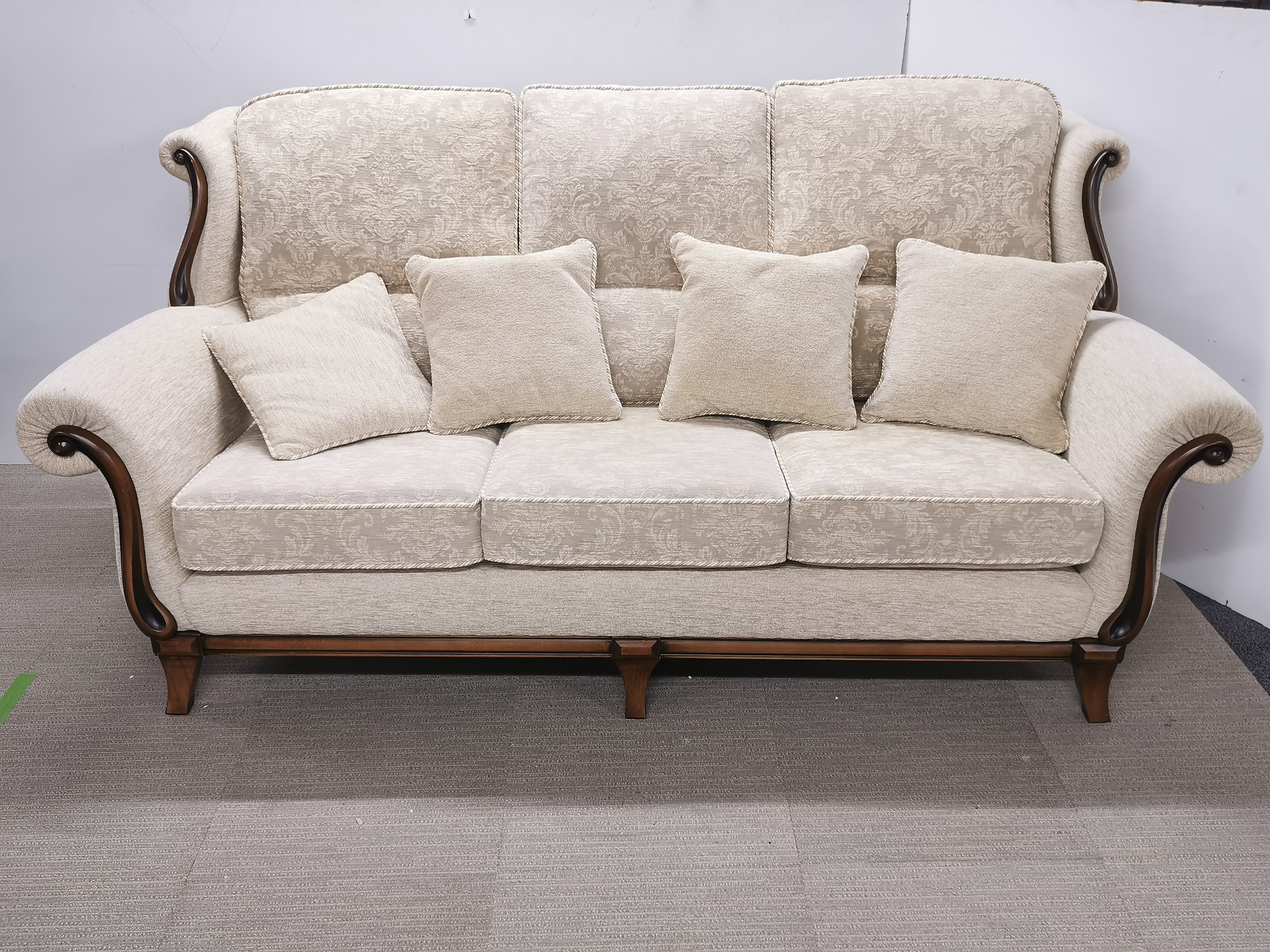 A heavy quality cream upholstered settee with a matching armchair and an Ercol footstool. - Image 2 of 5