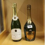 A 1982 bottle G H Mumm & Co champagne, together with a bottle of Coned D'arcos meio seco.