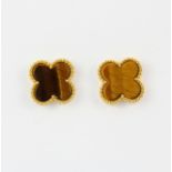 A pair of 18ct yellow gold clover shaped stud earrings set with tiger's eye, 1.5cm.