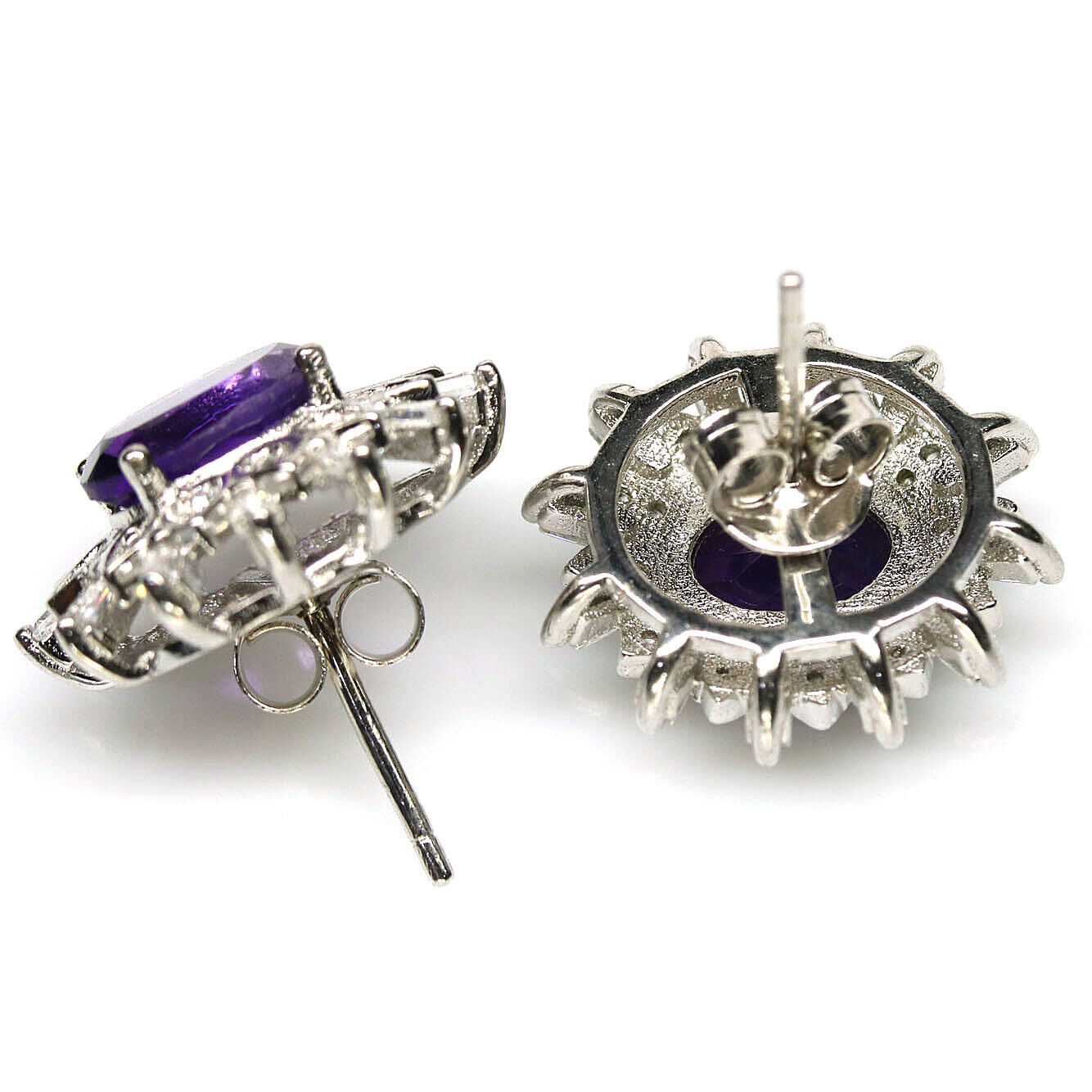 A pair of 925 silver cluster earrings set with oval cut amethysts and white stones, L. 1.7cm. - Image 2 of 2