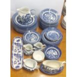 An extensive Churchill willow pattern dinner service and other items.