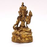 A Tibetan gilt bronze figure of a seated Tara, H. 15cm. Prov. Estate of the late Dr. James (Jim)