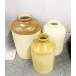 Three large stoneware jars, largest H. 48cm.