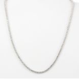 An 18ct white gold necklace set with brilliant cut diamonds, approx. 9.25ct total, L. 44cm. Colour