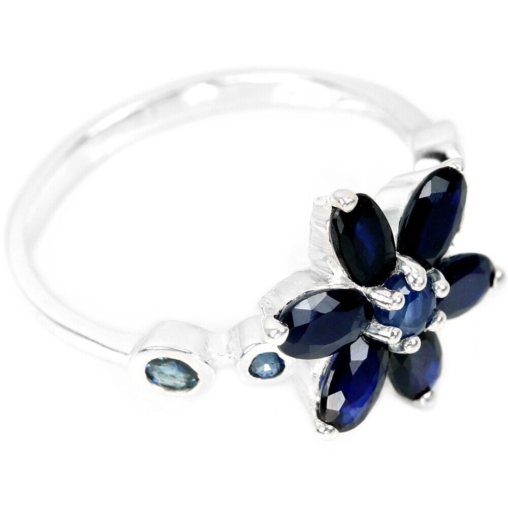 A 925 silver flower shaped ring set with oval cut sapphires, (O). - Image 3 of 3